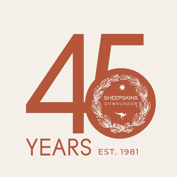 A 45th anniversary graphic for Sheepskins Downunder, featuring a large terracotta-colored '45' with a white laurel wreath and kangaroo emblem inside the zero. Below, 'YEARS EST.
